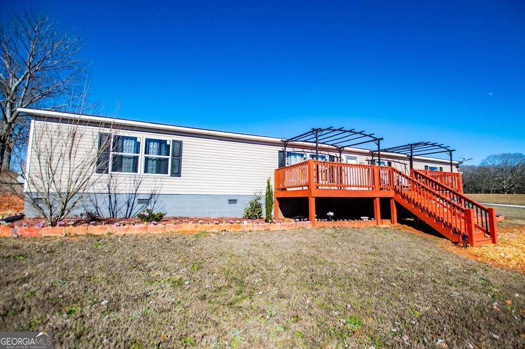 450 Glenloch Road Roopville, GA 30170 - Photo 2 of 60 a view of a house with a yard