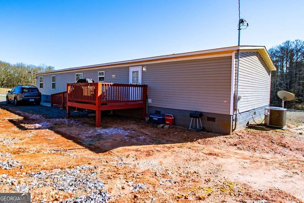 450 Glenloch Road Roopville, GA 30170 - Photo 56 of 60 a front view of a house with a yard