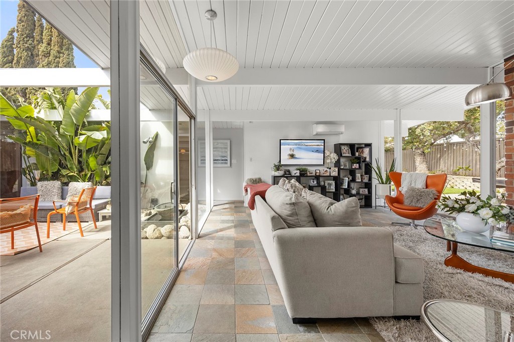 1791 North Winlock Street Orange, CA 92865 - Photo 17 of 39 a living room with furniture and a large window