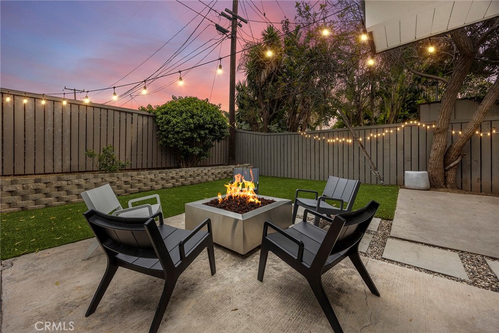 1791 North Winlock Street Orange, CA 92865 - Photo 39 of 39 a view of a chairs and tables in the back yard of the house