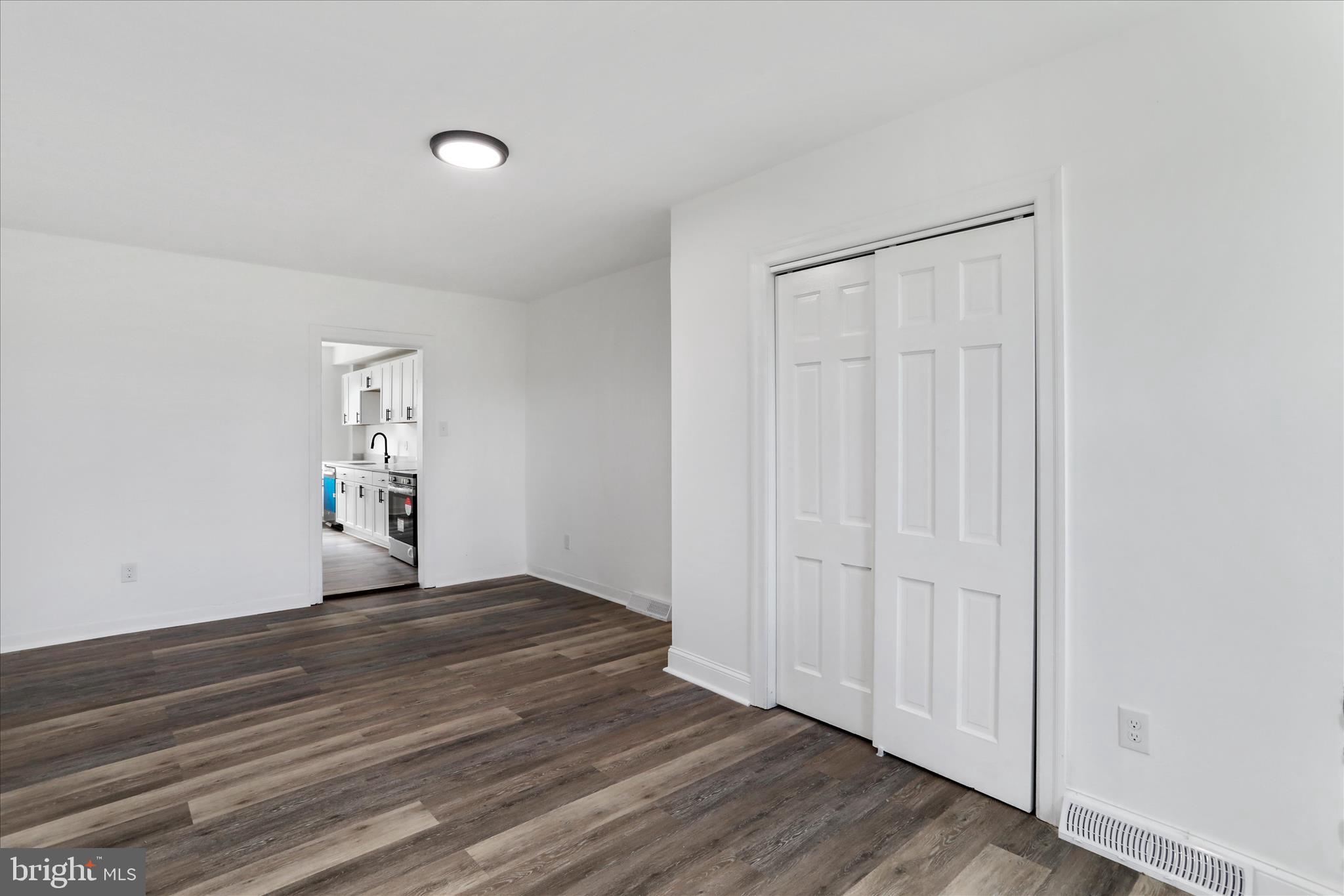 15225 Fairview Road Clear Spring, MD 21722 - Photo 18 of 43 a view of an empty room with wooden floor