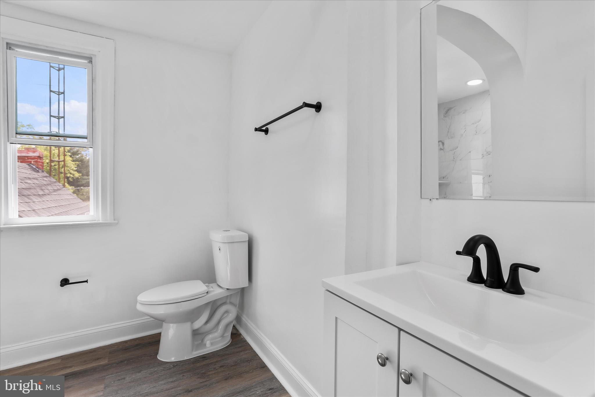 15225 Fairview Road Clear Spring, MD 21722 - Photo 25 of 43 a bathroom with a toilet sink and mirror