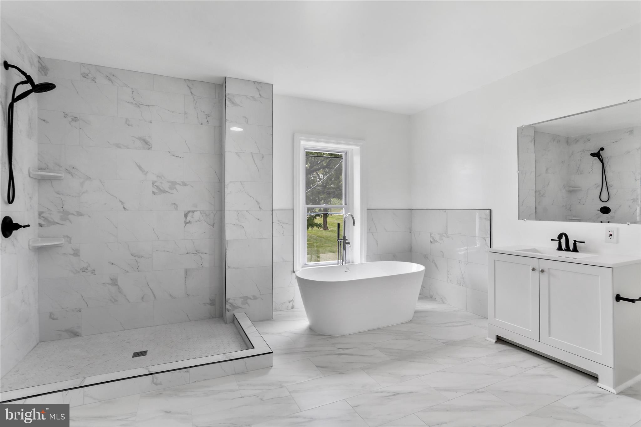 15225 Fairview Road Clear Spring, MD 21722 - Photo 29 of 43 a bathroom with a bathtub sink mirror and toilet