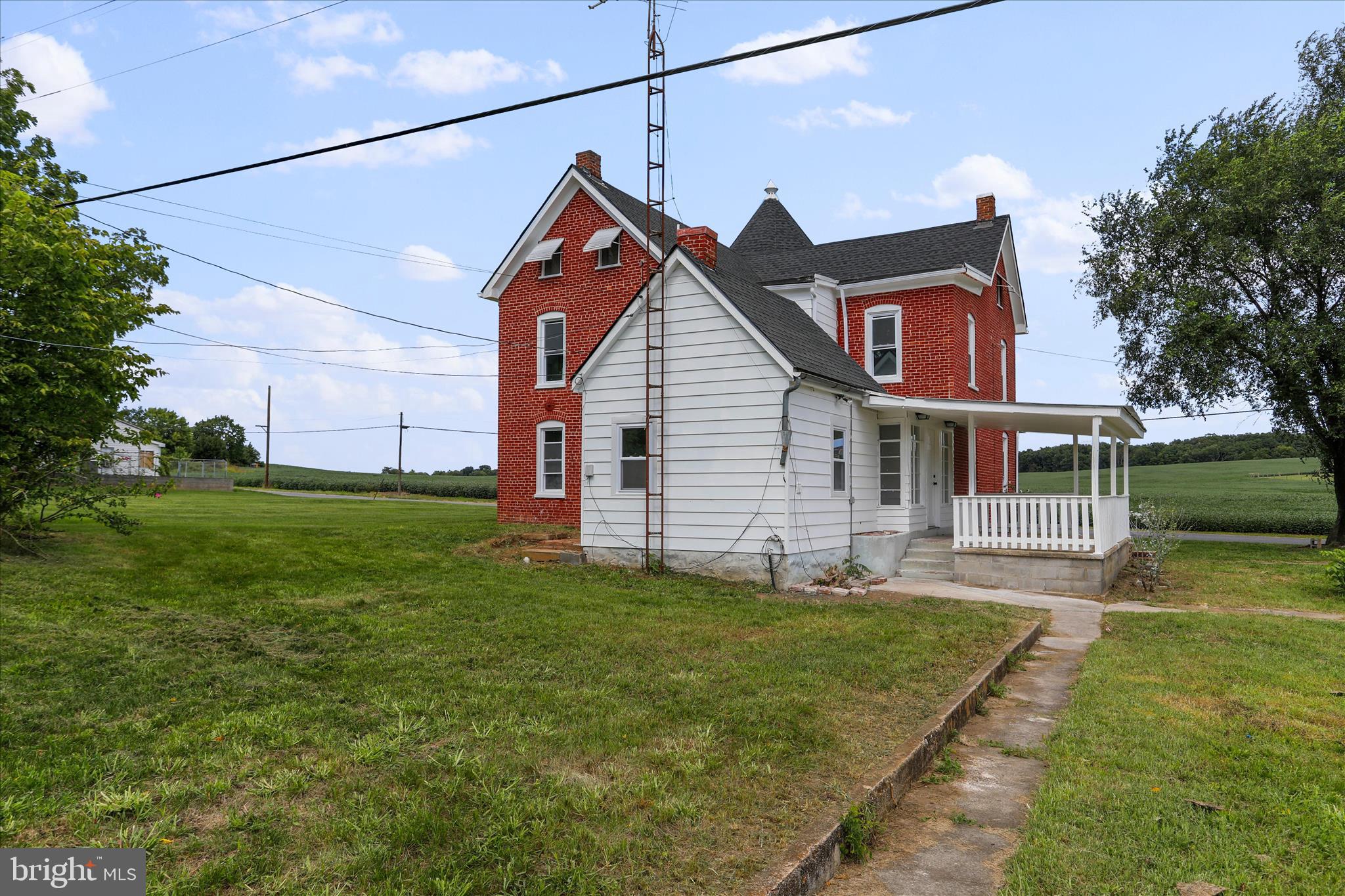 15225 Fairview Road Clear Spring, MD 21722 - Photo 36 of 43 a front view of house with yard and green space