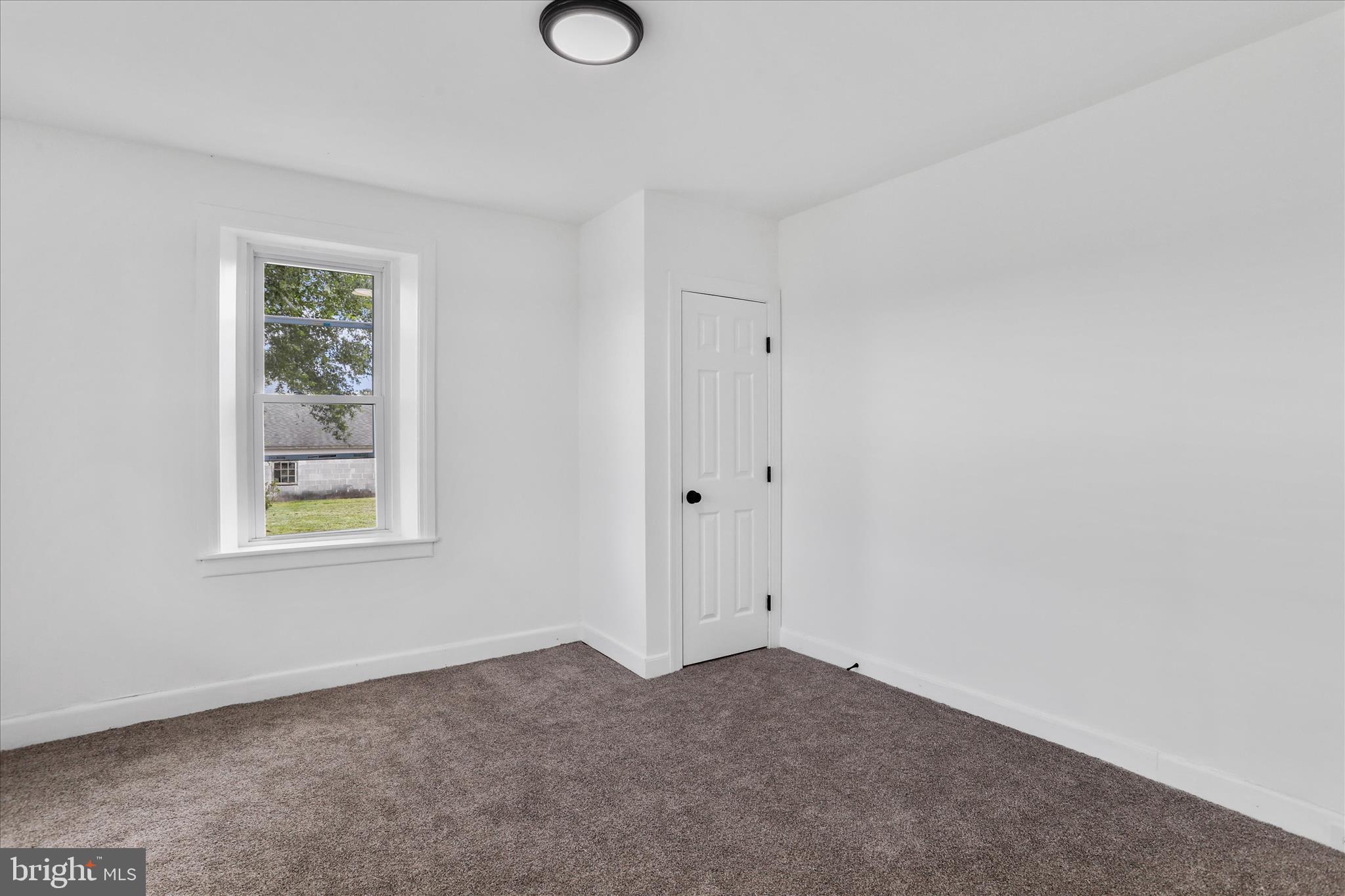 15225 Fairview Road Clear Spring, MD 21722 - Photo 6 of 43 a view of an empty room with a window