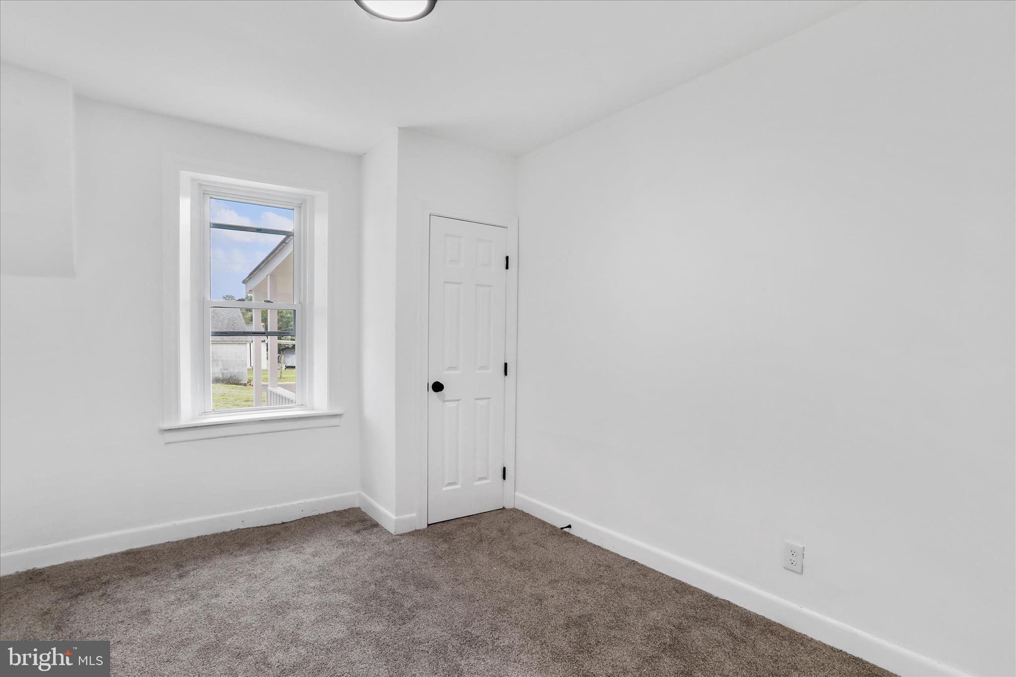 15225 Fairview Road Clear Spring, MD 21722 - Photo 8 of 43 an empty room with windows and closet