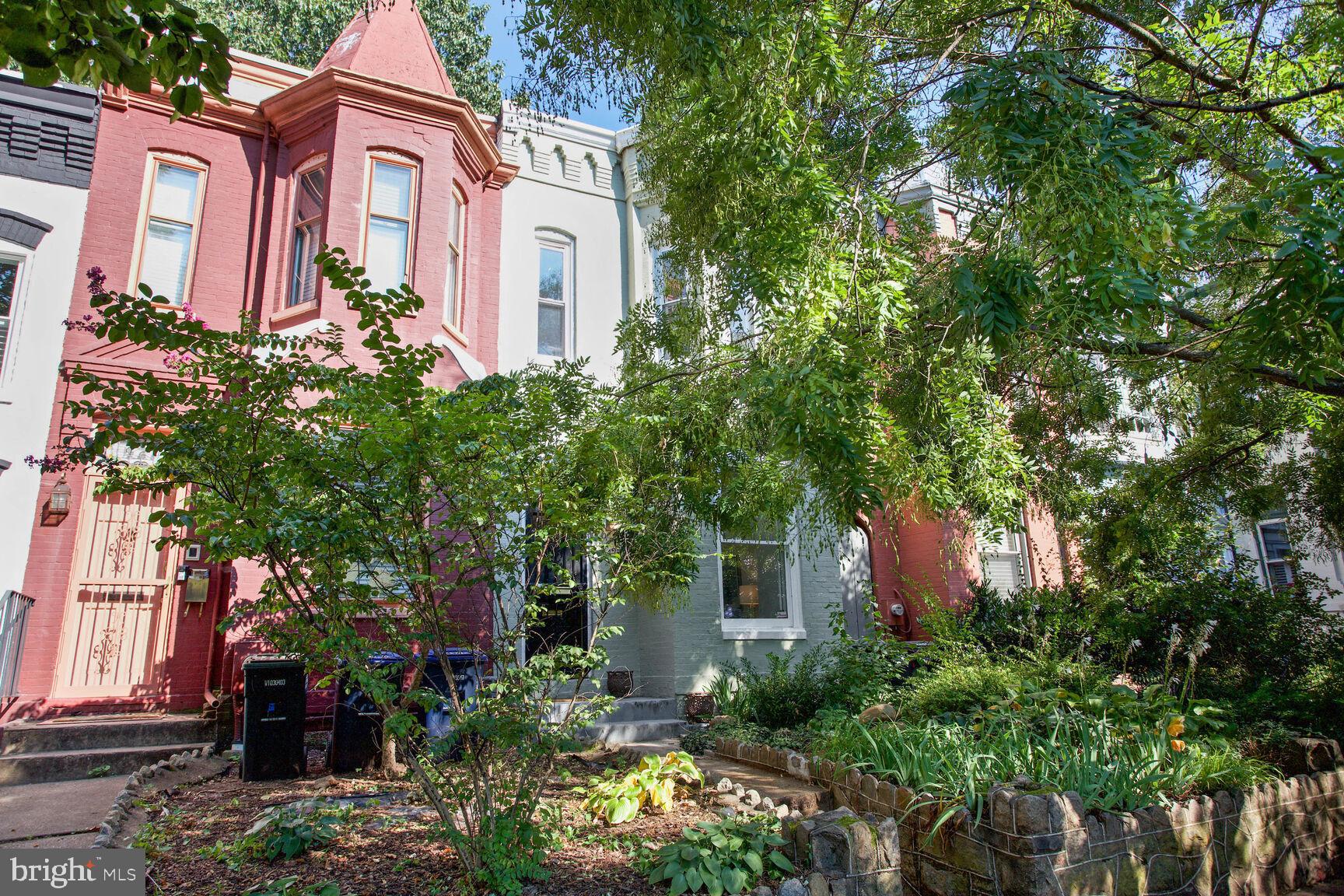 425 5th Street Northeast Washington, DC 20002 - Photo 1 of 25 a front view of a house with a yard and tree s
