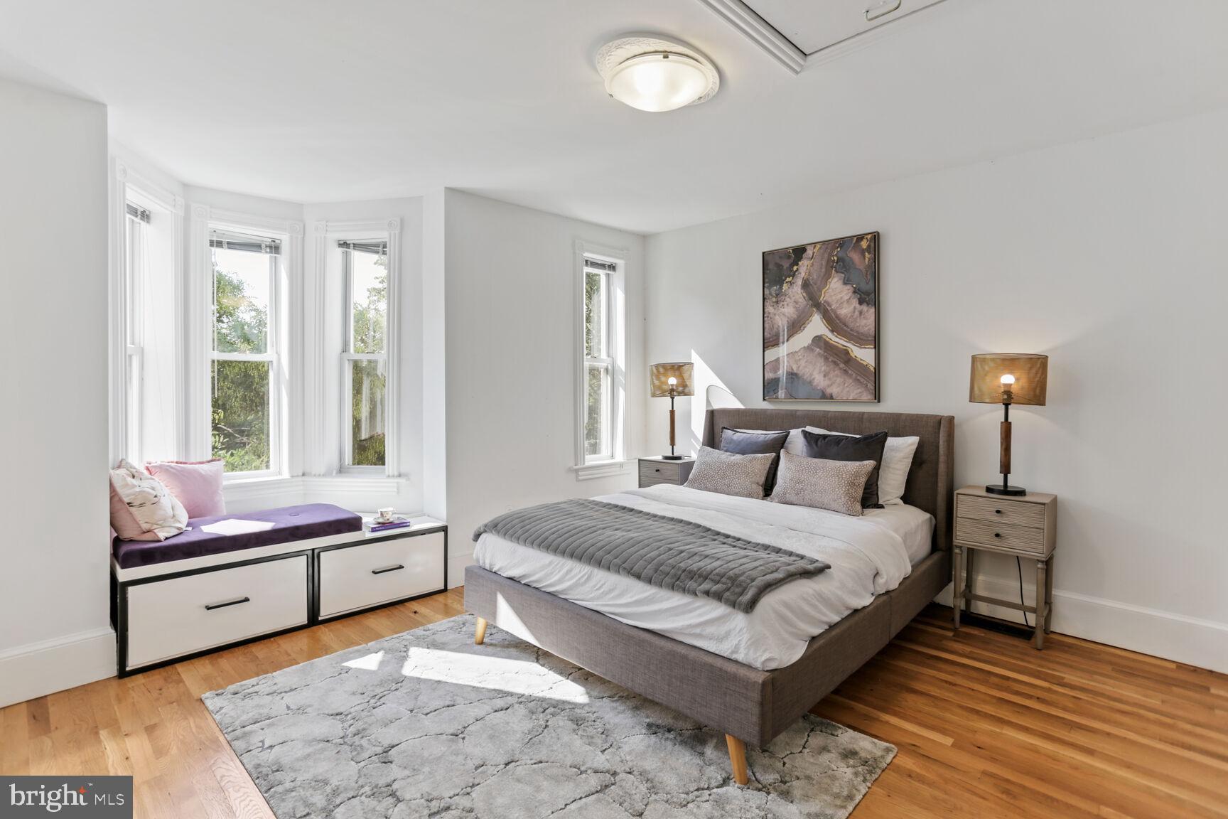 425 5th Street Northeast Washington, DC 20002 - Photo 12 of 25 a bedroom with a bed and a window