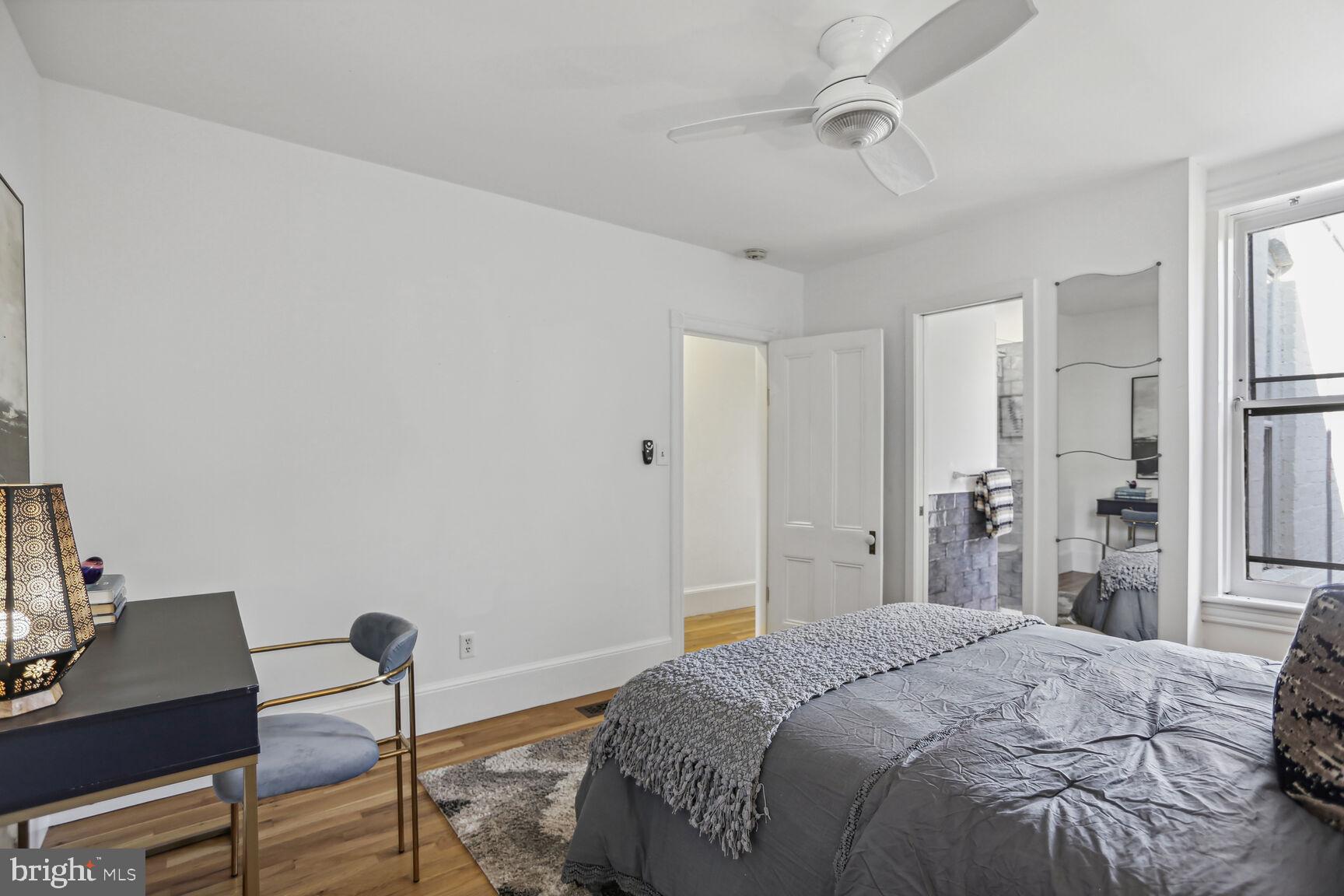 425 5th Street Northeast Washington, DC 20002 - Photo 16 of 25 a bedroom with a bed and a desk
