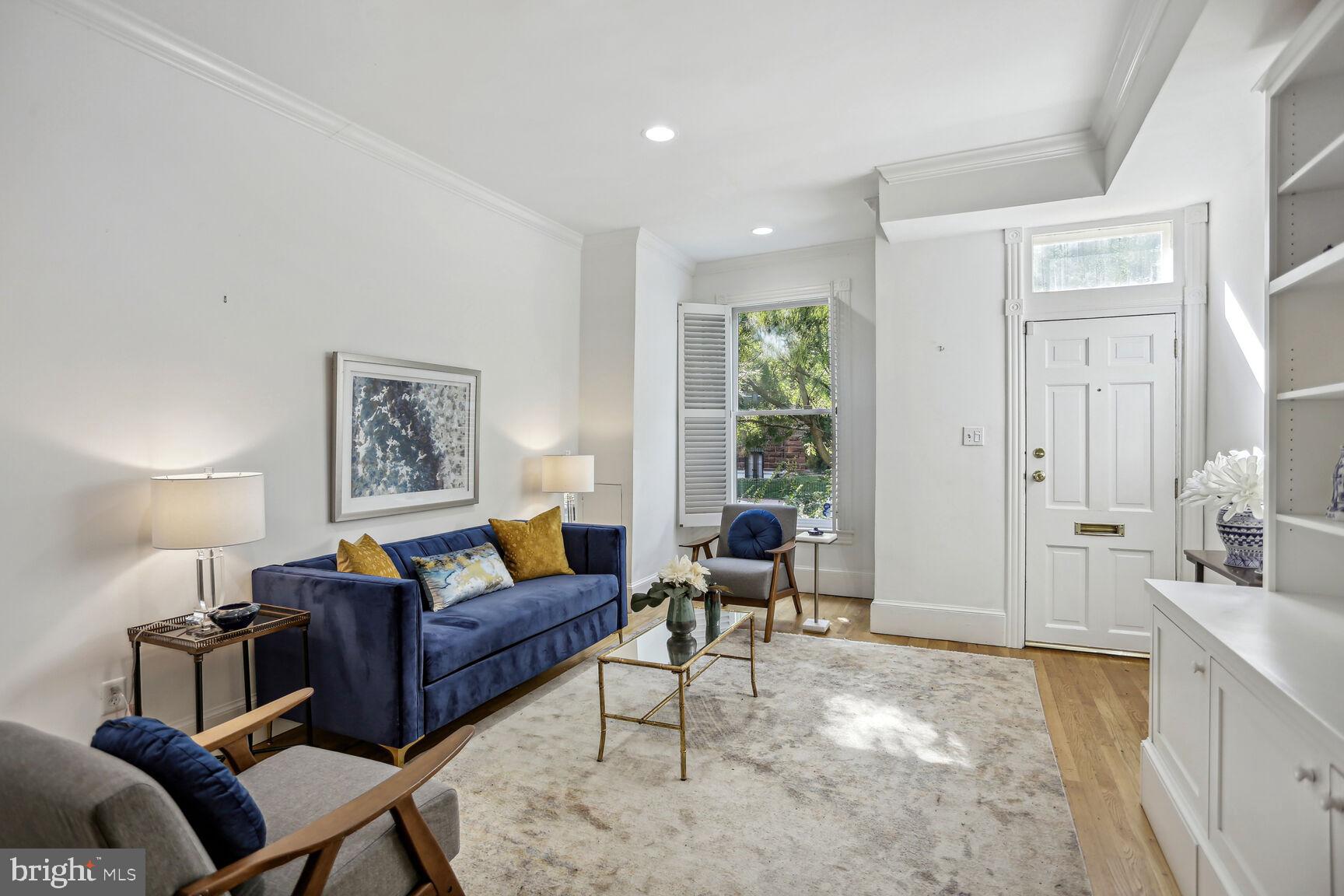 425 5th Street Northeast Washington, DC 20002 - Photo 4 of 25 a living room with furniture and a large window
