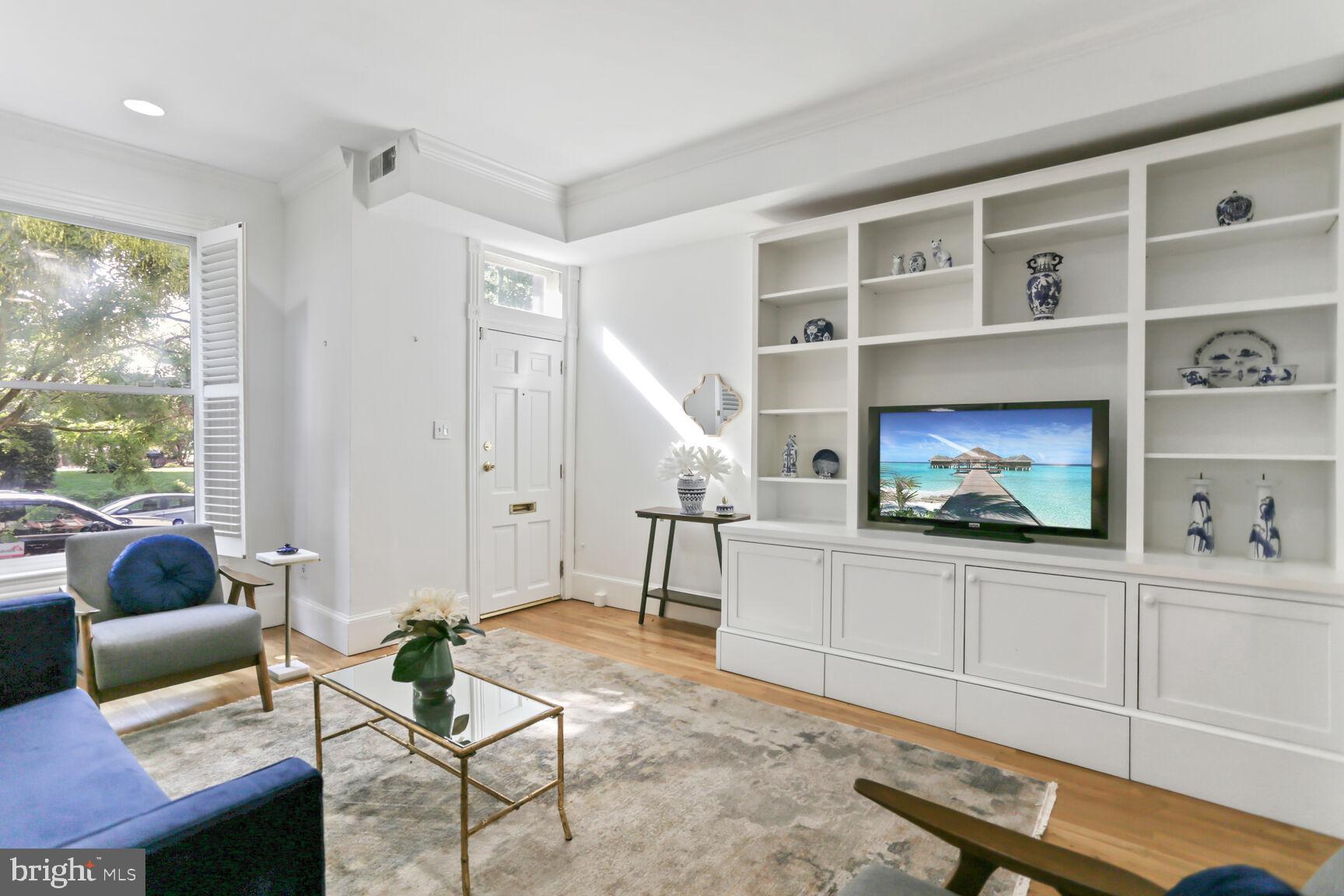 425 5th Street Northeast Washington, DC 20002 - Photo 5 of 25 a living room with furniture and a flat screen tv