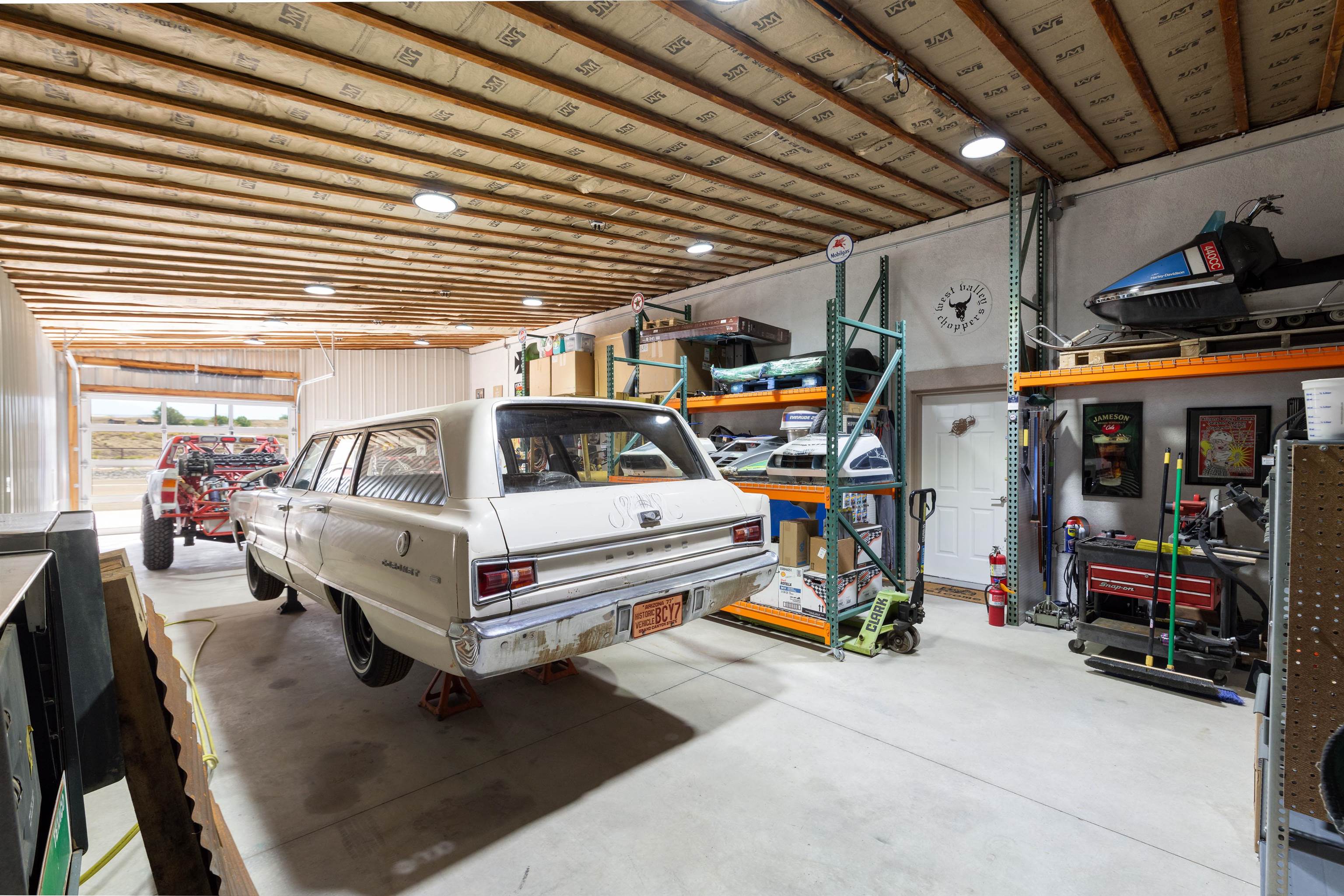 33376 Mill Tailing Road Whitewater, CO 81527 - Photo 30 of 42 a car parked in garage