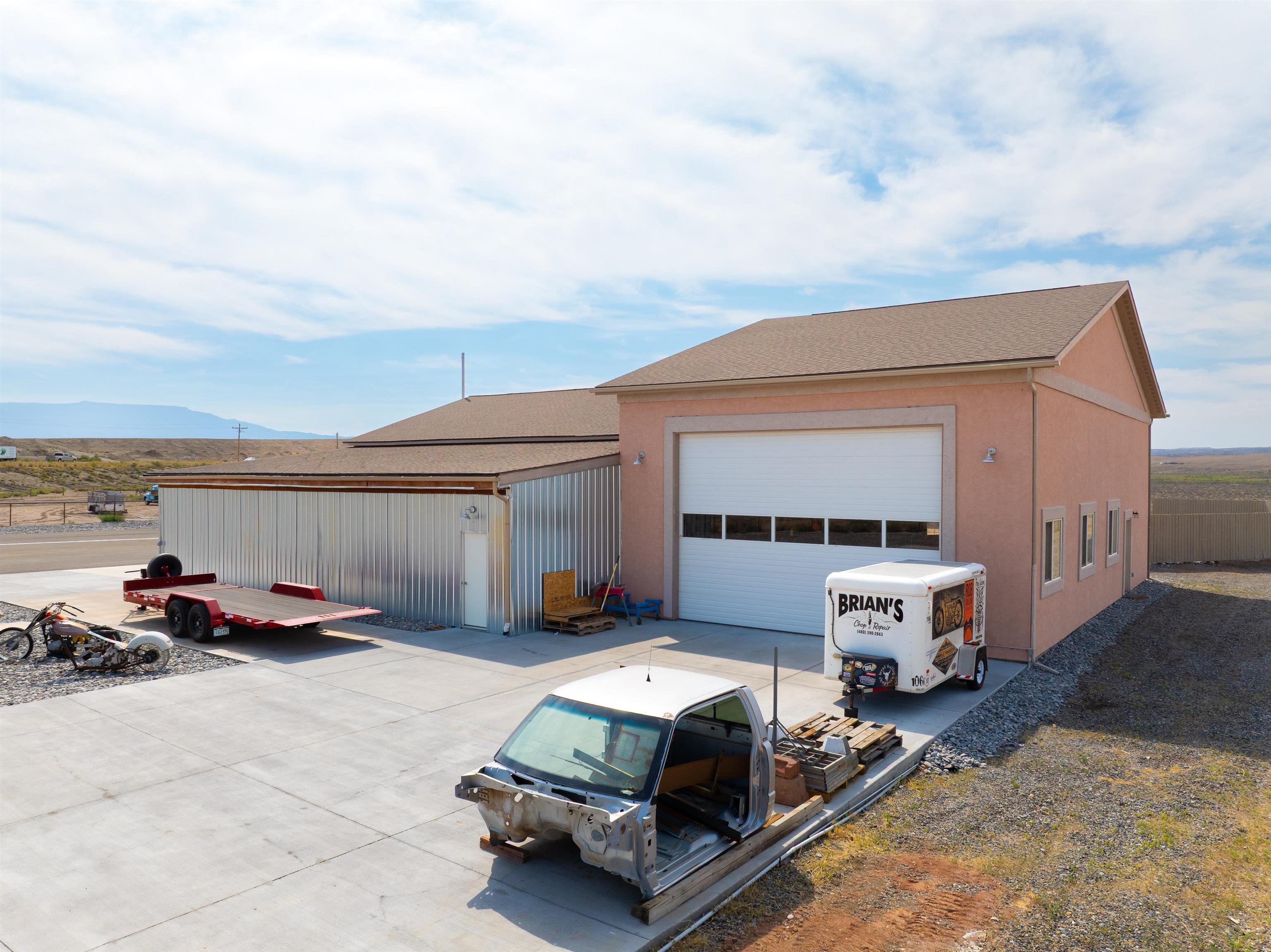 33376 Mill Tailing Road Whitewater, CO 81527 - Photo 38 of 42 a car parked in front of house