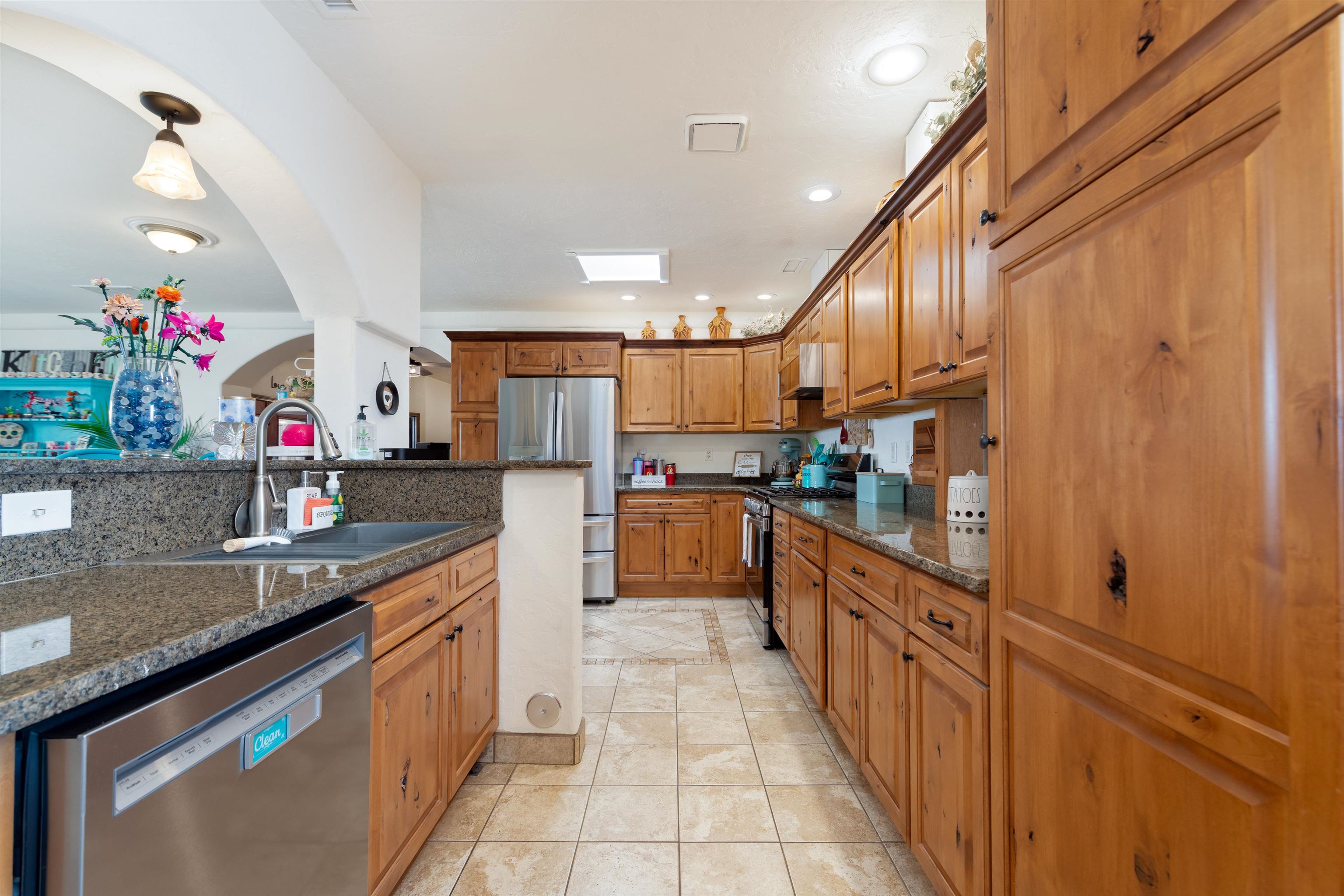 33376 Mill Tailing Road Whitewater, CO 81527 - Photo 9 of 42 a kitchen with stainless steel appliances granite countertop a sink counter space and cabinets