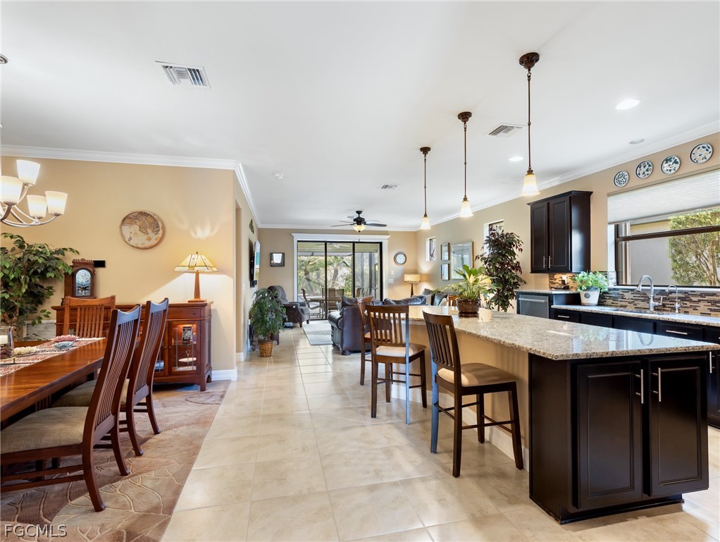 10878 Dennington Road Fort Myers, FL 33913 - Photo 20 of 50 a view of a dining area with furniture
