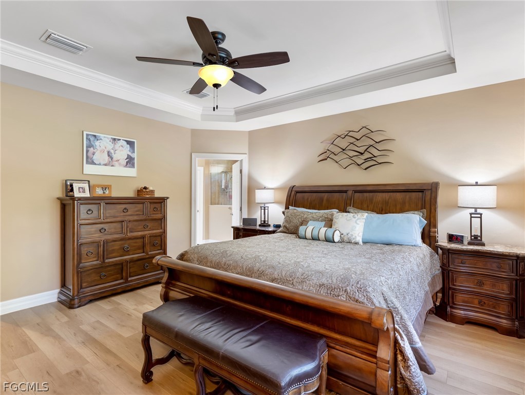 10878 Dennington Road Fort Myers, FL 33913 - Photo 30 of 50 a bedroom with a bed and furniture