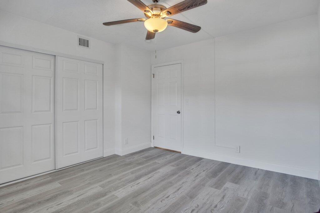 17388 Boca Club Boulevard, Unit 201 Boca Raton, FL 33487 - Photo 17 of 44 Guest 2nd Bedroom to Entry.jpg-SMALL