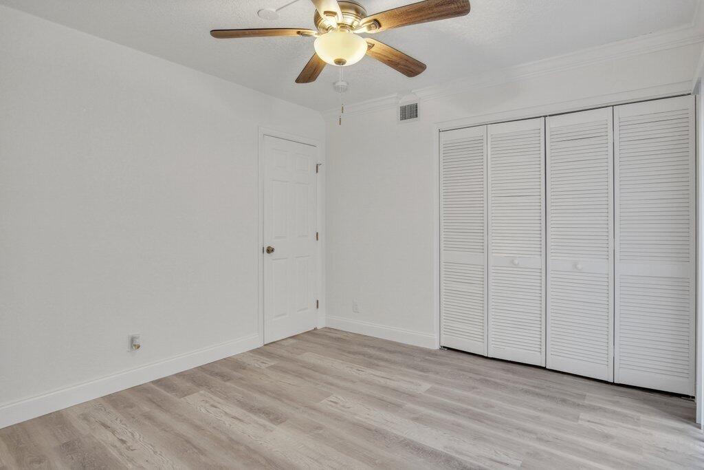 17388 Boca Club Boulevard, Unit 201 Boca Raton, FL 33487 - Photo 19 of 44 Guest Bedroom to Entry.jpg-SMALL