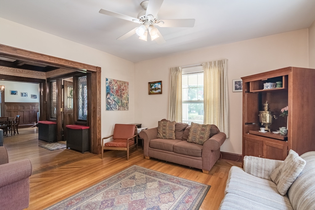 128 Maplewood Terrace Springfield, MA 01108 - Photo 13 of 42 a living room with furniture and a window