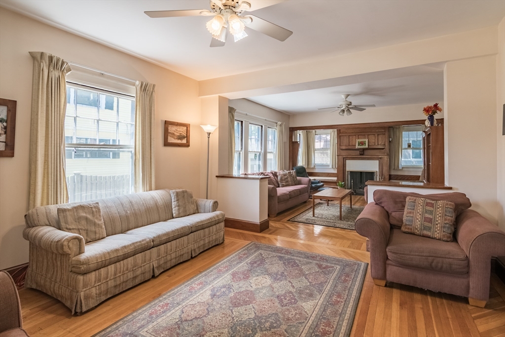 128 Maplewood Terrace Springfield, MA 01108 - Photo 14 of 42 a living room with furniture and a large window