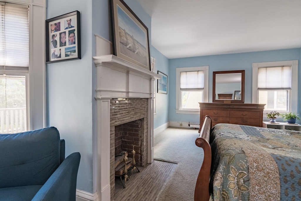 128 Maplewood Terrace Springfield, MA 01108 - Photo 19 of 42 a living room with furniture and a fireplace