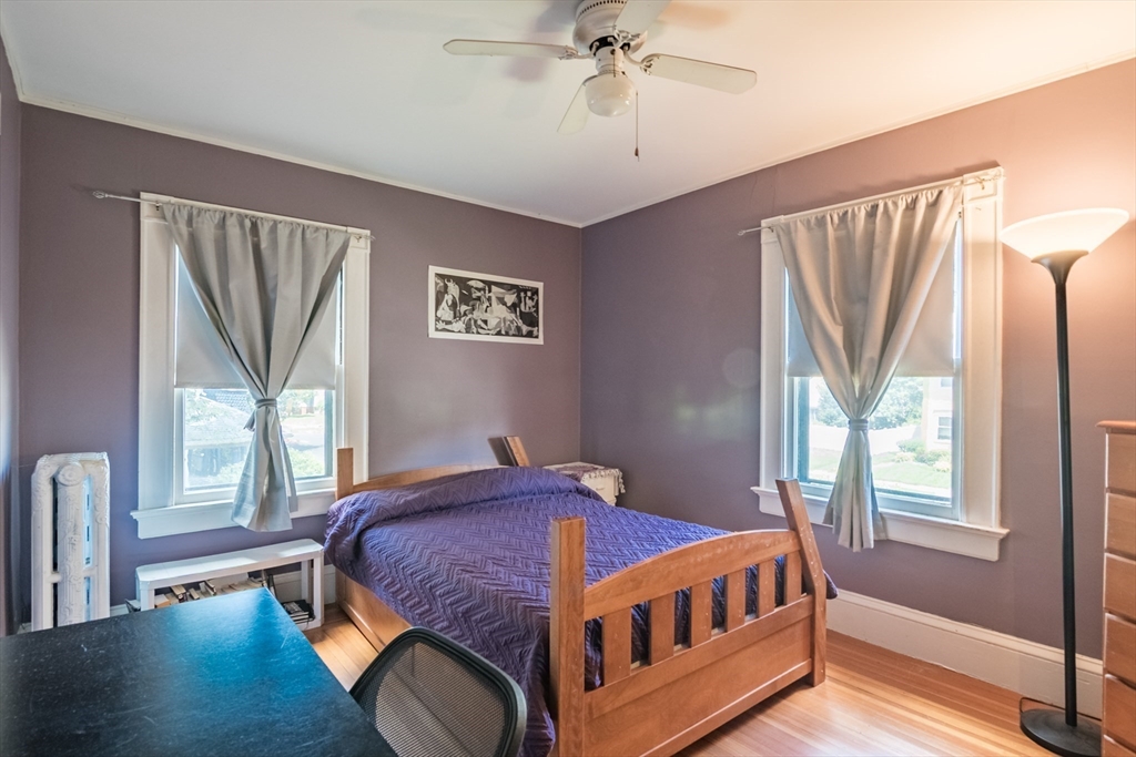 128 Maplewood Terrace Springfield, MA 01108 - Photo 23 of 42 a bedroom with a bed and a window