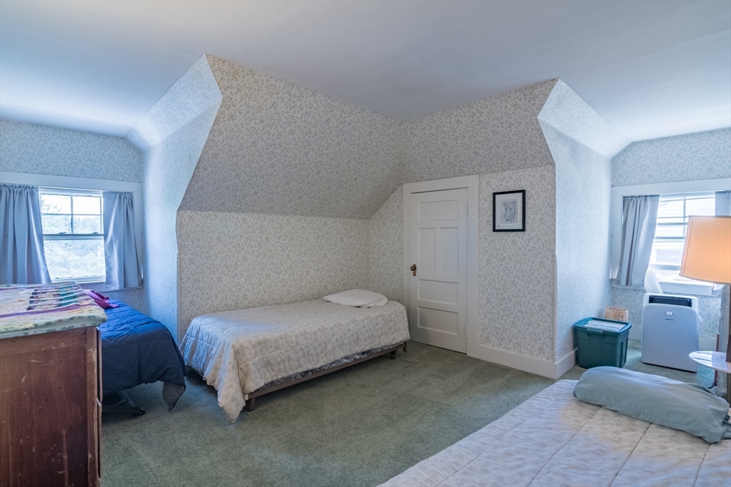 128 Maplewood Terrace Springfield, MA 01108 - Photo 31 of 42 a bedroom with a bed and a couch