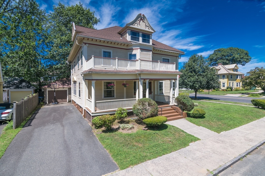 128 Maplewood Terrace Springfield, MA 01108 - Photo 38 of 42 a front view of a house with a yard