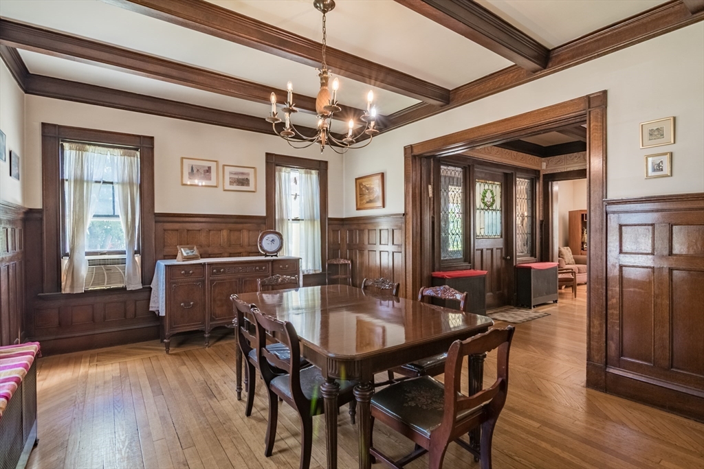 128 Maplewood Terrace Springfield, MA 01108 - Photo 7 of 42 a dining room with a wooden table and chairs