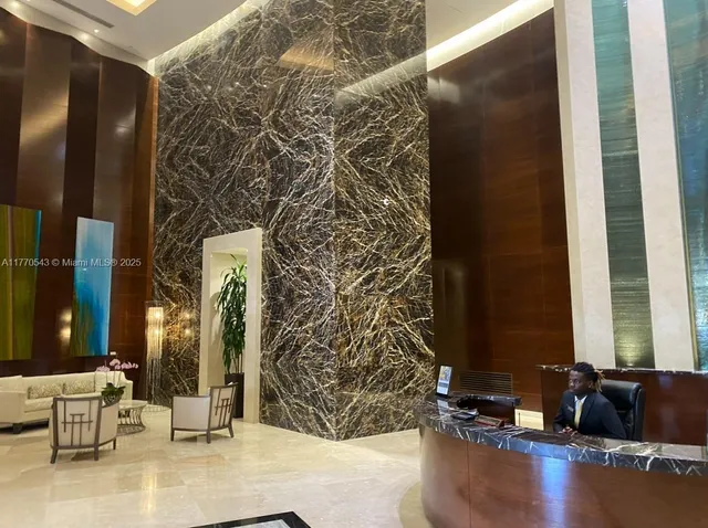 a view of balcony with wooden floor