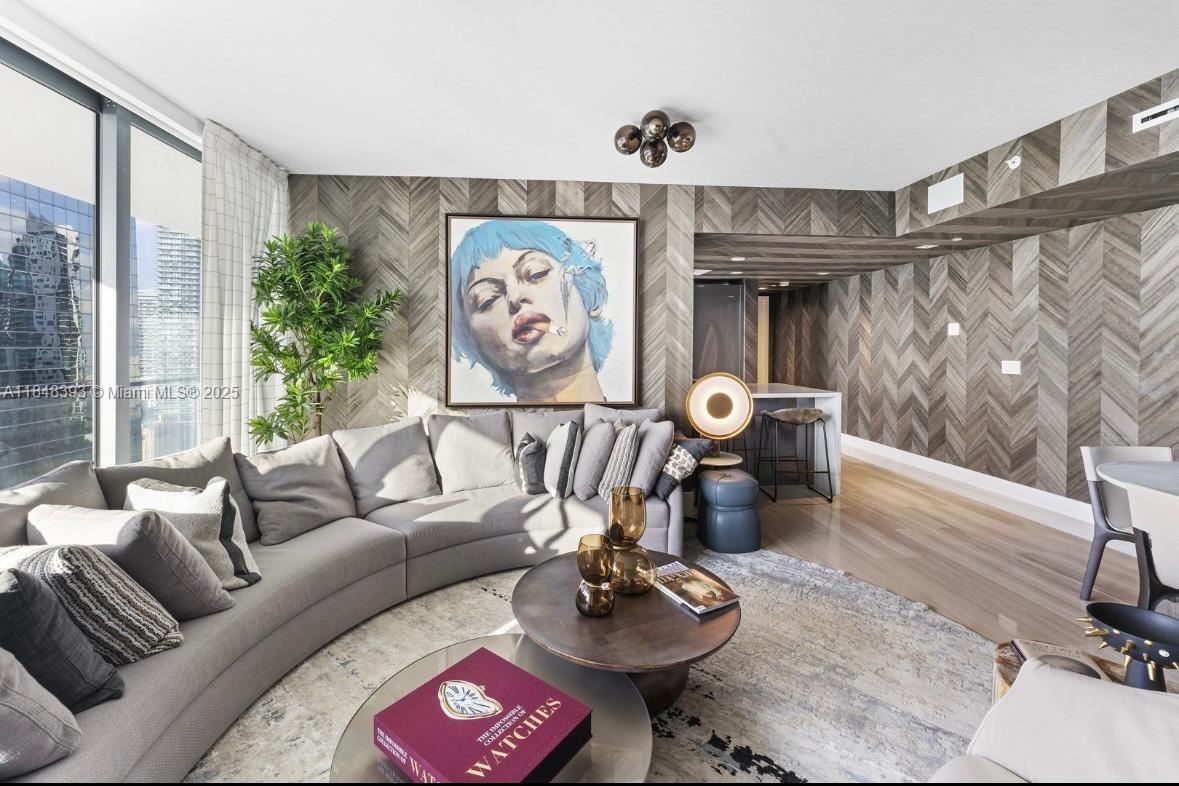 1451 Brickell Avenue, Unit 2505 Miami, FL 33131 - Photo 15 of 30 a living room with furniture and wooden floor