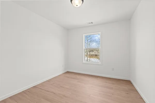 an empty room with a window