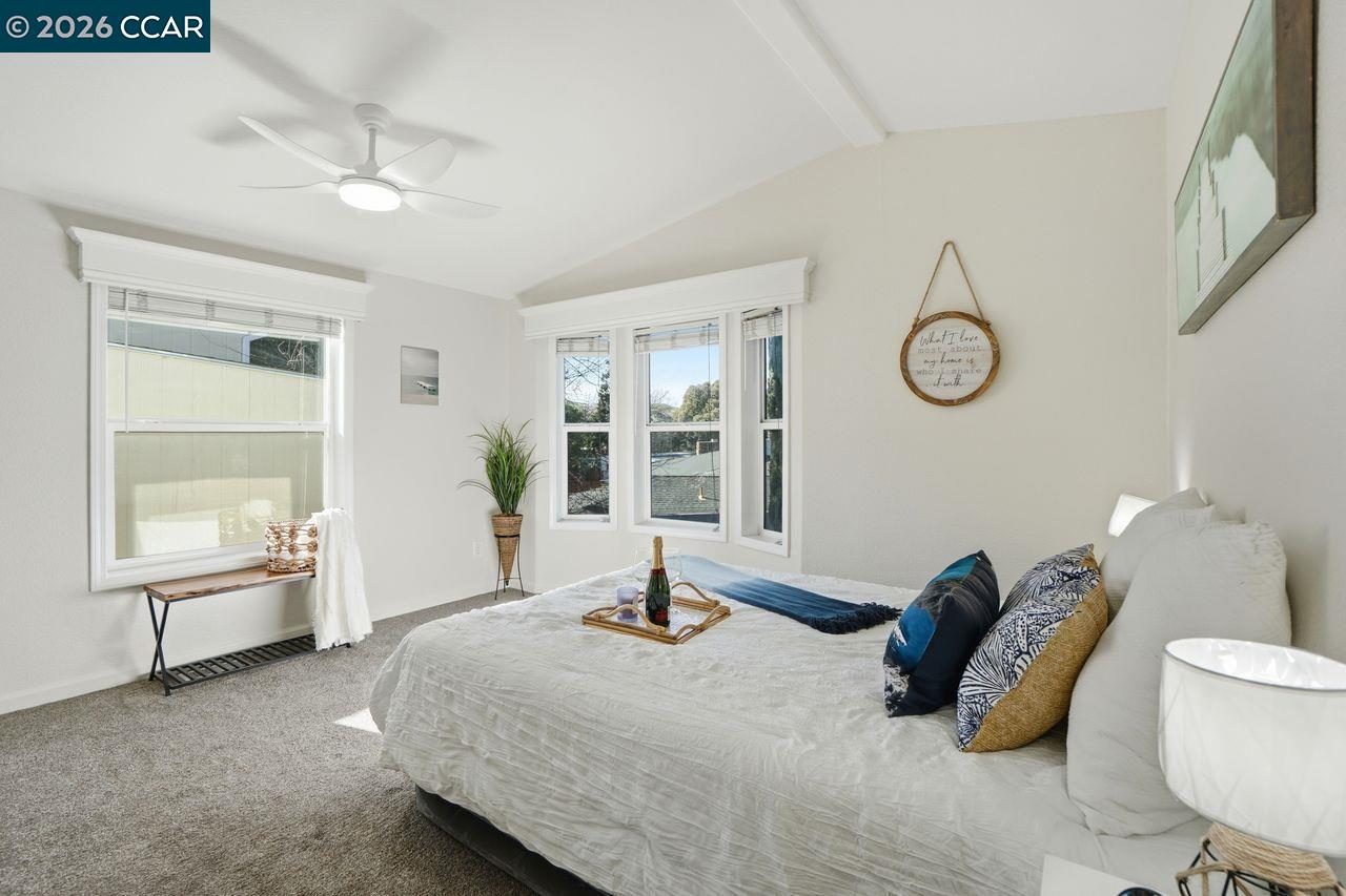 3777 Willow Pass Road, Unit 20 Bay Point, CA 94565 - Photo 15 of 35 a bedroom with bed and window