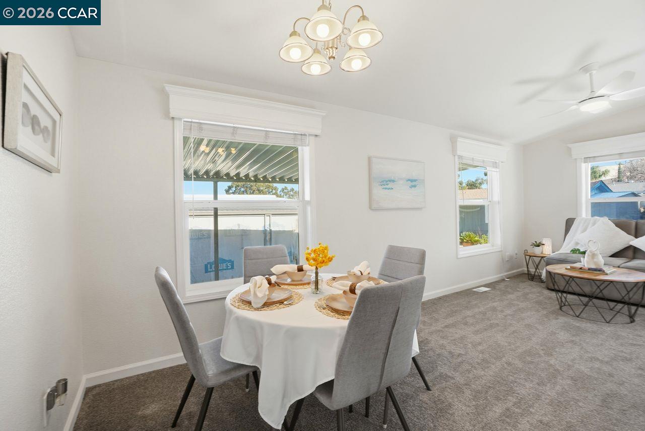 3777 Willow Pass Road, Unit 20 Bay Point, CA 94565 - Photo 7 of 35 a view of a dining room with furniture window and outside view