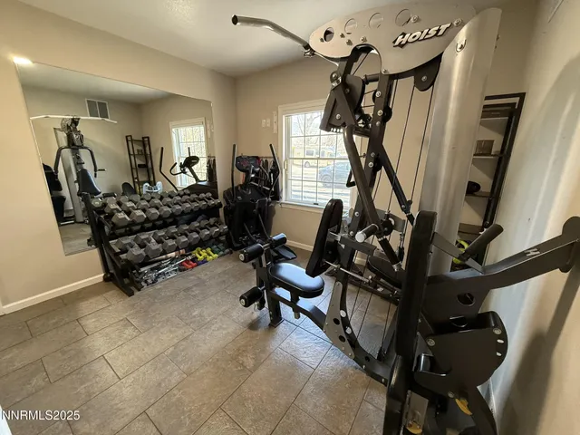 a view of a livingroom with furniture and wooden floor