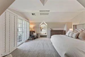 a kitchen with stainless steel appliances a stove a sink and a refrigerator