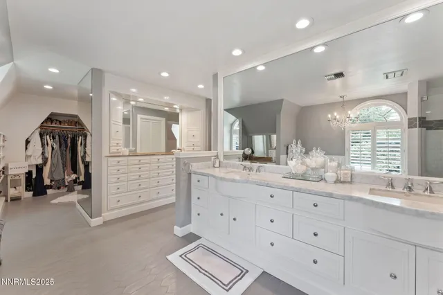 a view of swimming pool with seating space