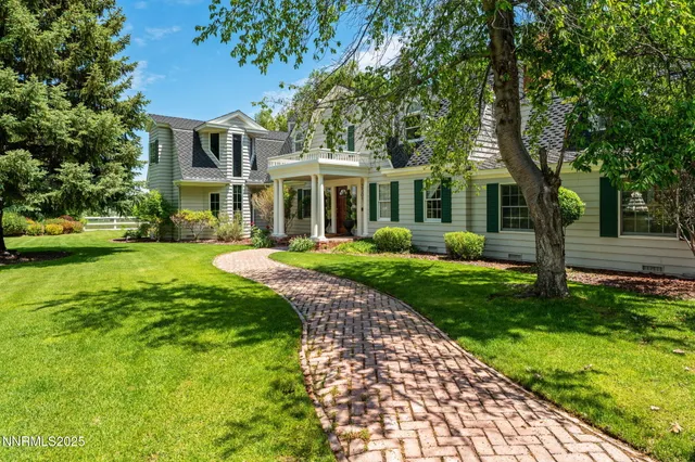 a living room with furniture or couch and a window