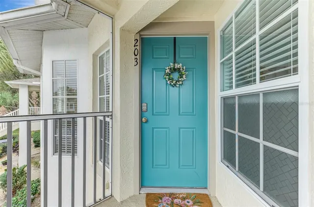 a view of a hallway to a livingroom with a hallway