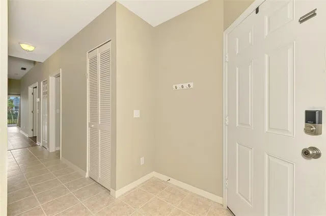 a view of a kitchen with a sink and a window