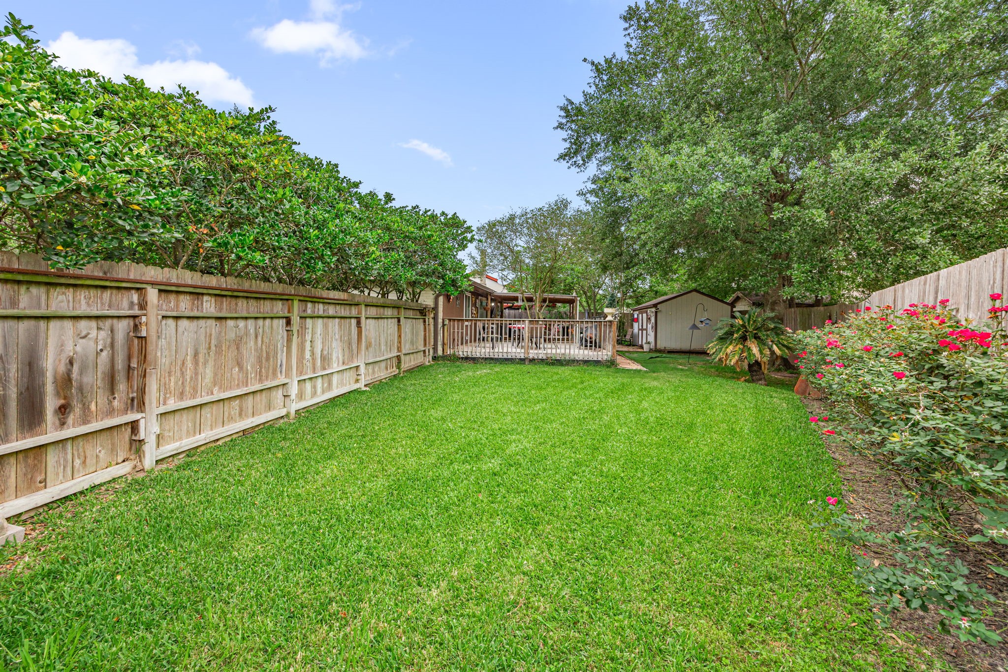 21302 Bridgepoint Lane Spring, TX 77388 - Photo 24 of 30 Even with the deck there's plenty of green space for enjoyment