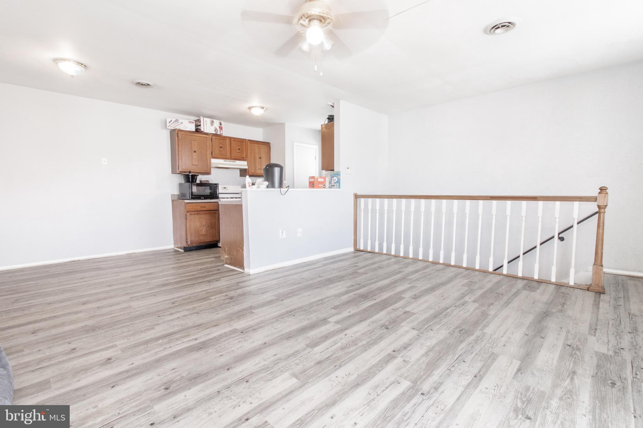 829 Windstream Way, Unit D Edgewood, MD 21040 - Photo 2 of 13 Living Room, durable laminate flooring throughout