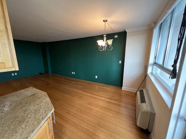 a kitchen with a refrigerator a sink and a stove
