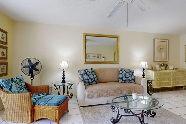 a living room with furniture and a table