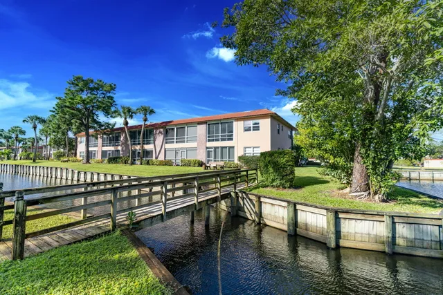 a view of a house with a big yard