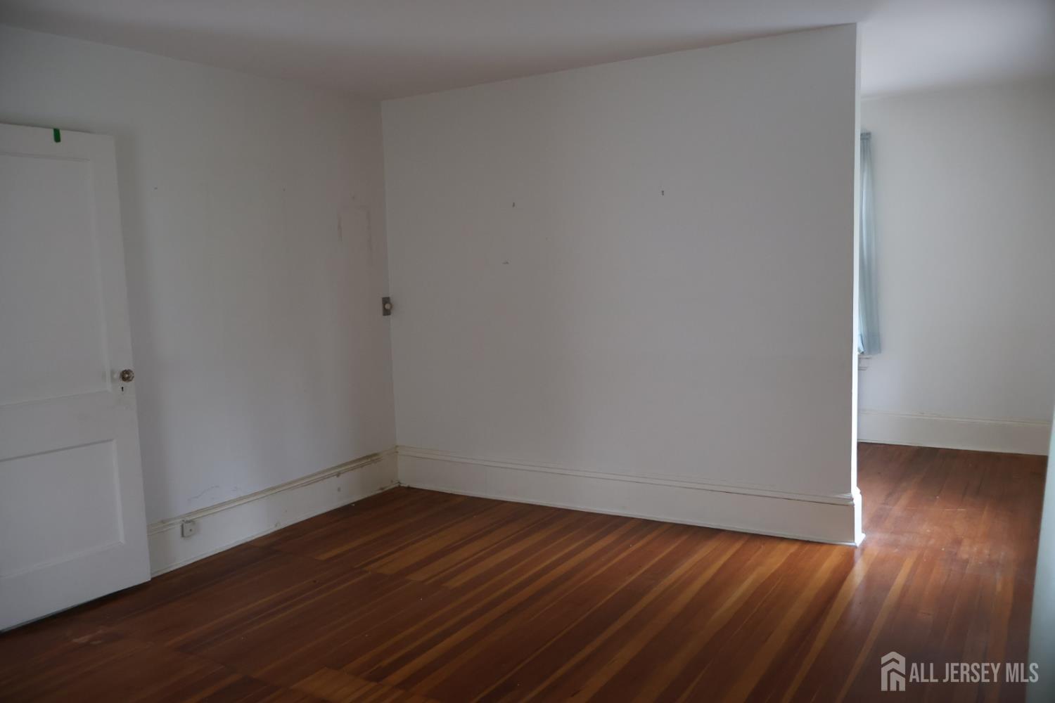 40 Prospect Street Summit, NJ 07901 - Photo 11 of 17 a view of an empty room with wooden floor