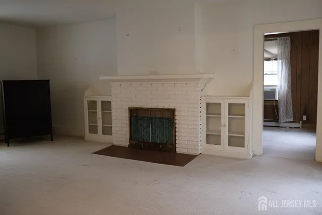 a view of a livingroom with a fireplace