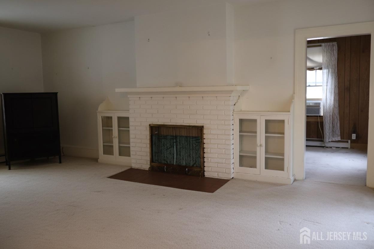 40 Prospect Street Summit, NJ 07901 - Photo 7 of 17 a view of a livingroom with a fireplace