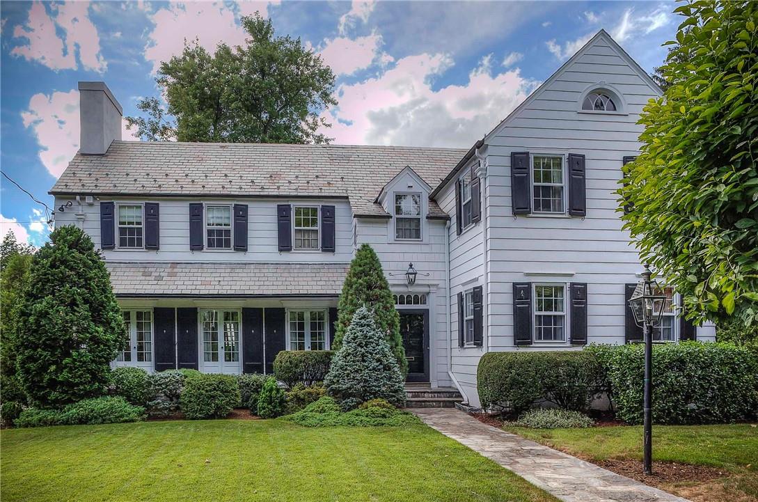 41 White Plains Road Bronxville, NY 10708 - Photo 1 of 1 a front view of house with yard and green space