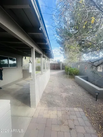 a view of backyard with green space